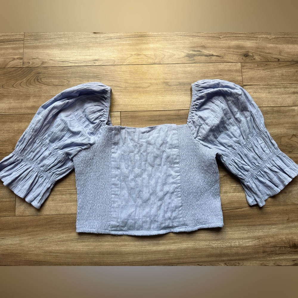 FOREVER 21 
Cloud Blue Trumpet Sleeve Smocked Crop Top Size 1X NWT